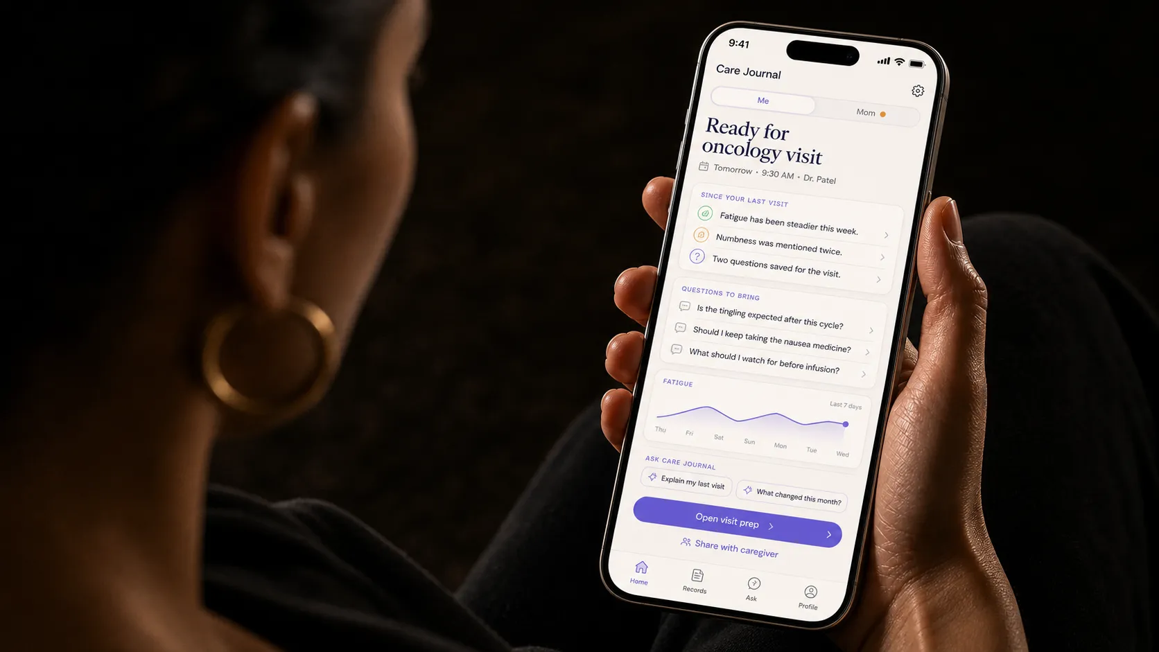 Editorial photo of a patient holding the ctcae grading mobile app.